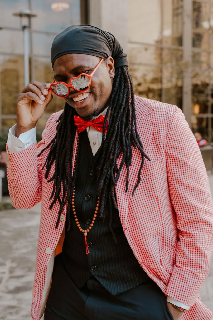 man in rose jacket